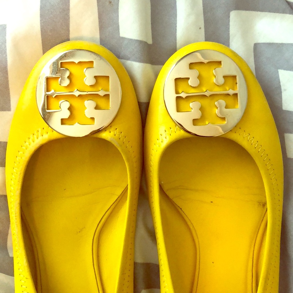 Yellow Tory Burch shoes.